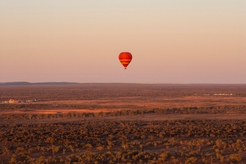 Hot air balloon mid-air near Alice Springs